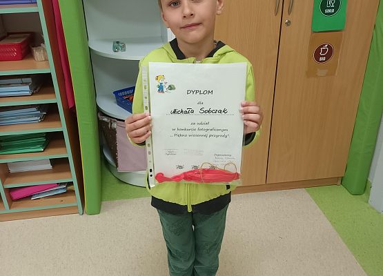 zdjęcie Michała z dyplomem